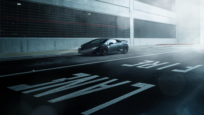 road, motion, speed, sign, arrow symbol, luxury vehicle, no people, supercar, communication, black car, car, transportation, land vehicle, architecture