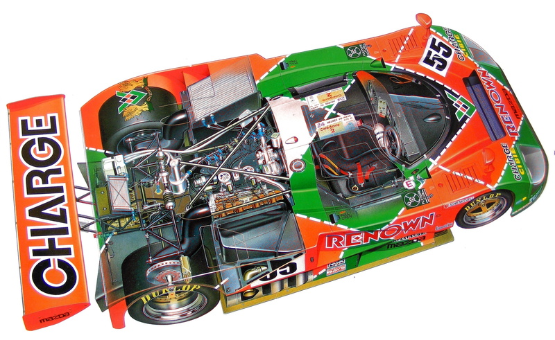 white background, orange color, building exterior, architecture, built structure, multi colored, 2K, no people, mazda 787b, western script, communication