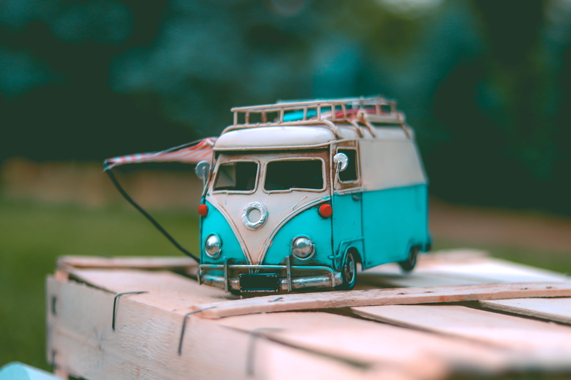 selective focus, cast, miniature, van, no people, outdoors, blue, teal, volkswagen, day, metal, toy car, retro styled, die, focus on foreground, nostalgia