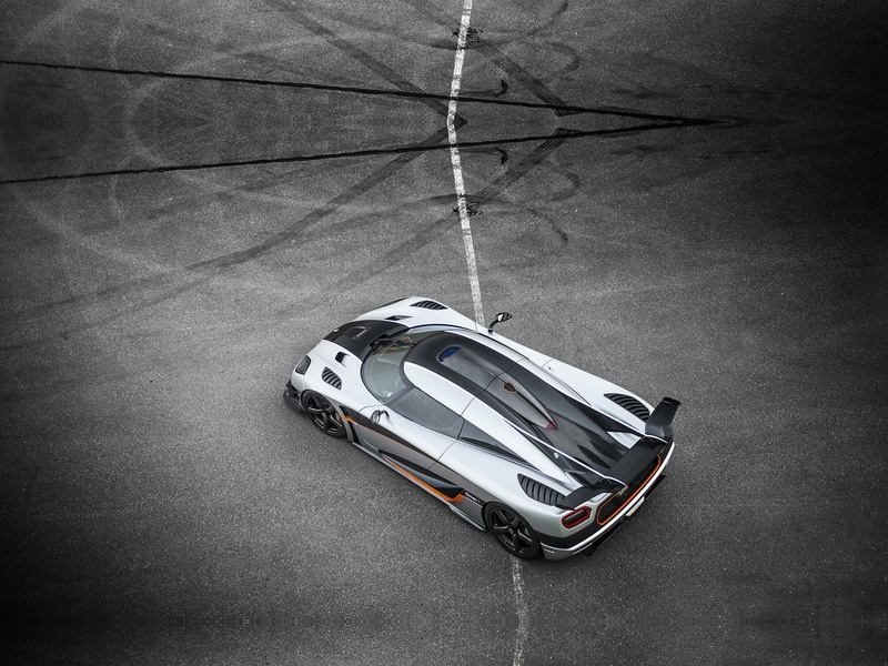 single object, land vehicle, speed, mode of transportation, city, no people, textured, motion, outdoors, street, sign, supercars, 4K, motor vehicle, silver colored