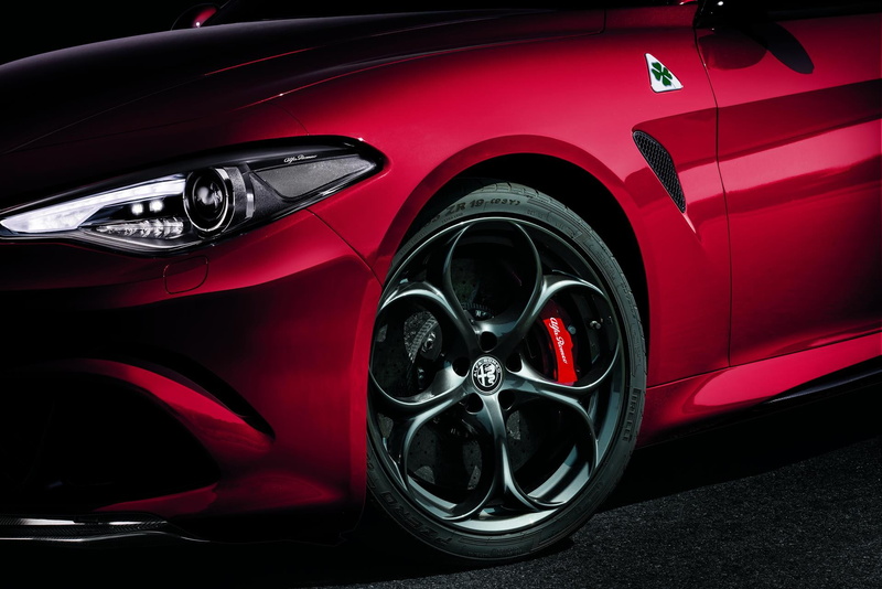 car, luxury, motor vehicle, wheel, tire, chrome, wealth, modern, transportation, indoors, close-up, black color, reflection, no people, quadrifoglio, land vehicle