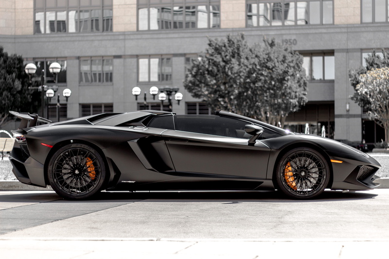 lamborghini, built structure, land vehicle, outdoors, aventador, motor vehicle, exotic, personal land vehicle, luxury, silver colored, garage, city, retro styled