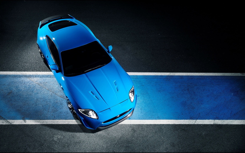 blue, sunlight, day, protection, outdoors, no people, security, toy, personal accessory, sport, mode of transportation, nature, road, Jaguar XKR, Jaguar
