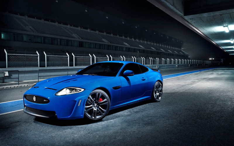 sign, road, parking lot, built structure, blue, mode of transportation, Jaguar XKR, garage, parking garage, car, sports car, indoors, blue cars, motor vehicle