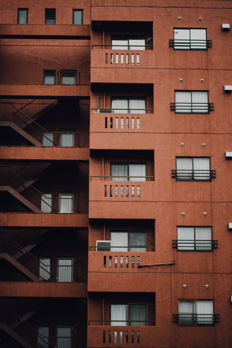 city, repetition, apartment, window, steps, blacony, side, glass - material, in a row, concrete, geometry, built structure, low angle view, exterior, pattern