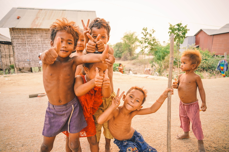 standing, sister, asia, portrait, poverty, girls, men, reap, family, happiness, emotion, thumbs up, travel, 5K, happy, women, tourism, togetherness, children