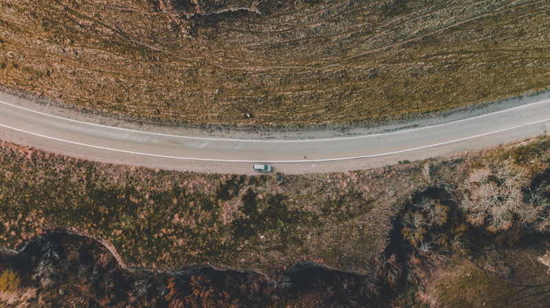 tranquil scene, drone view, high angle view, aerial, wilderness, road, plant, beauty in nature, nature, day, no people, outdoors, non-urban scene