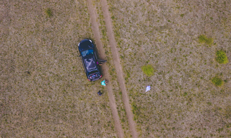 computer, outdoors, aerial view, abandoned, transport, looking down, high angle view, car, people, vehicle, no people, person, plant, van, beach, near
