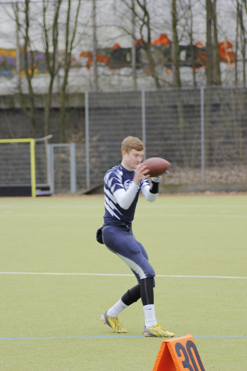 adolescence, team sport, soccer ball, soccer field, day, one person, leisure activity, outdoors, men, ball, full length, child, Football, motion, sport
