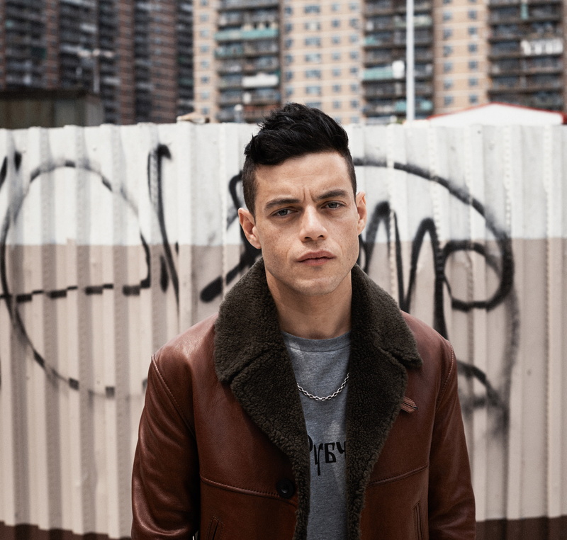 front view, city, built structure, serious, graffiti, casual clothing, standing, young adult, brick, hd, building exterior, handsome, lifestyles, attitude