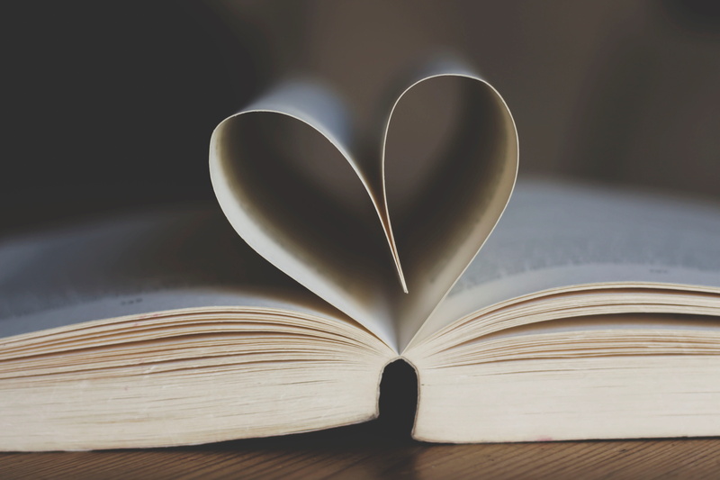 emotion, table, still life, wisdom, time out, wood - material, vacations, valentine, page, holiday, close-up, paperback, positive emotion, literature, library