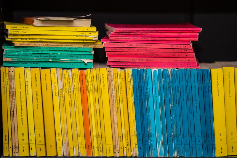 indoors, multi colored, no people, choice, black background, backgrounds, order, library, abundance, art and craft, variation, paperback, 4K, side by side
