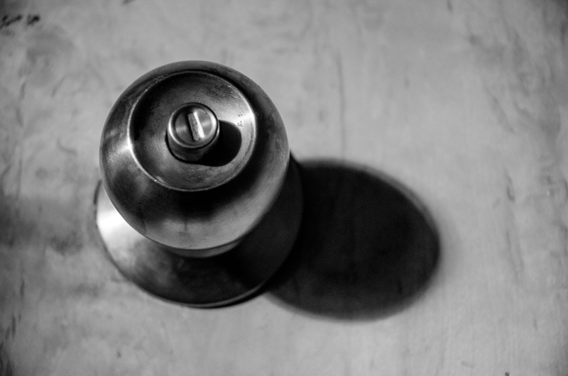 close-up, still life, high angle view, alloy, indoors, focus on foreground, wood, protect, security, house, shut, safety, door, table, directly above, container