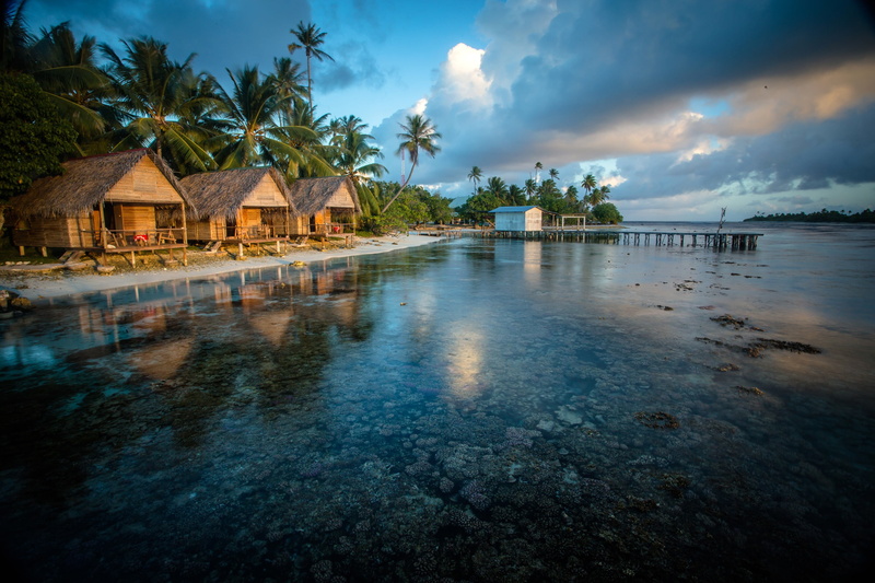 building, coral, landscape, cloud - sky, body, plant, coconut palm tree, 2K, architecture, tranquility, no people, swimming pool, water, sky, reflection