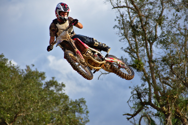 mid-air, motocross, bike, arts culture and entertainment, ramp, leisure activity, dirt, 5K, low angle view, full length, one person, jump, riding, dirtbike