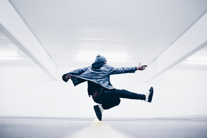 middle, taken, twirl, hood - clothing, full length, pointing, real people, rear view, 2K, clothing, spin, jumping, leisure activity, built structure, men
