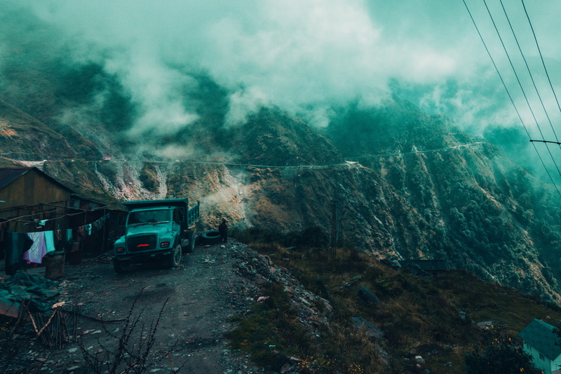 human, cloudy, tree, near, truck, land vehicle, 4K, outdoors, sikkim, gravel, offroad, plant, machine, mountains, day, india, road, public transportation