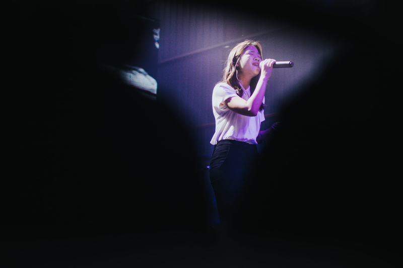dark, black background, copy space, girls, full length, white, inside, spotlight, room, women, apparel, musician, singing, music, young adult, purple, night