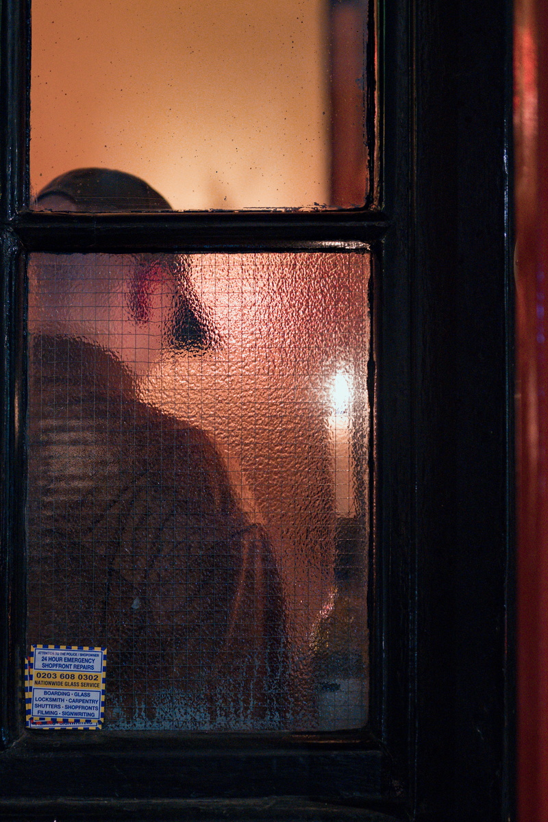 real people, clothing, close-up, one person, portrait, glass - material, electronics, art, door, flare, headshot, hairstyle, screen, man, display, lifestyles