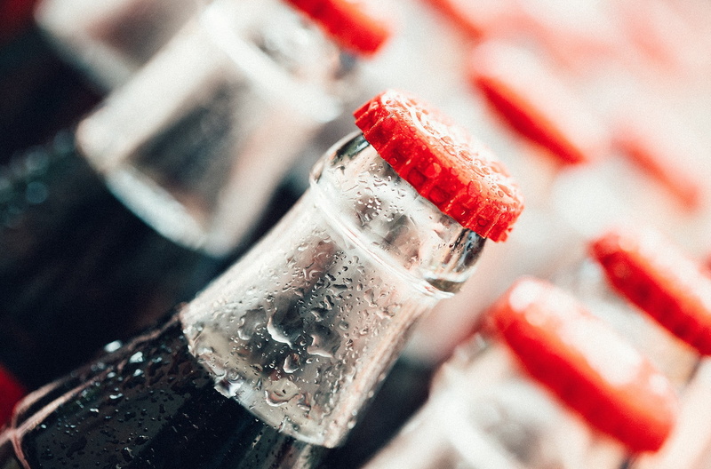 depth of field, food and drink, cold temperature, focus on foreground, silver, blurred, no people, alcohol, strawberry, frozen, food, drink, gemstone, red