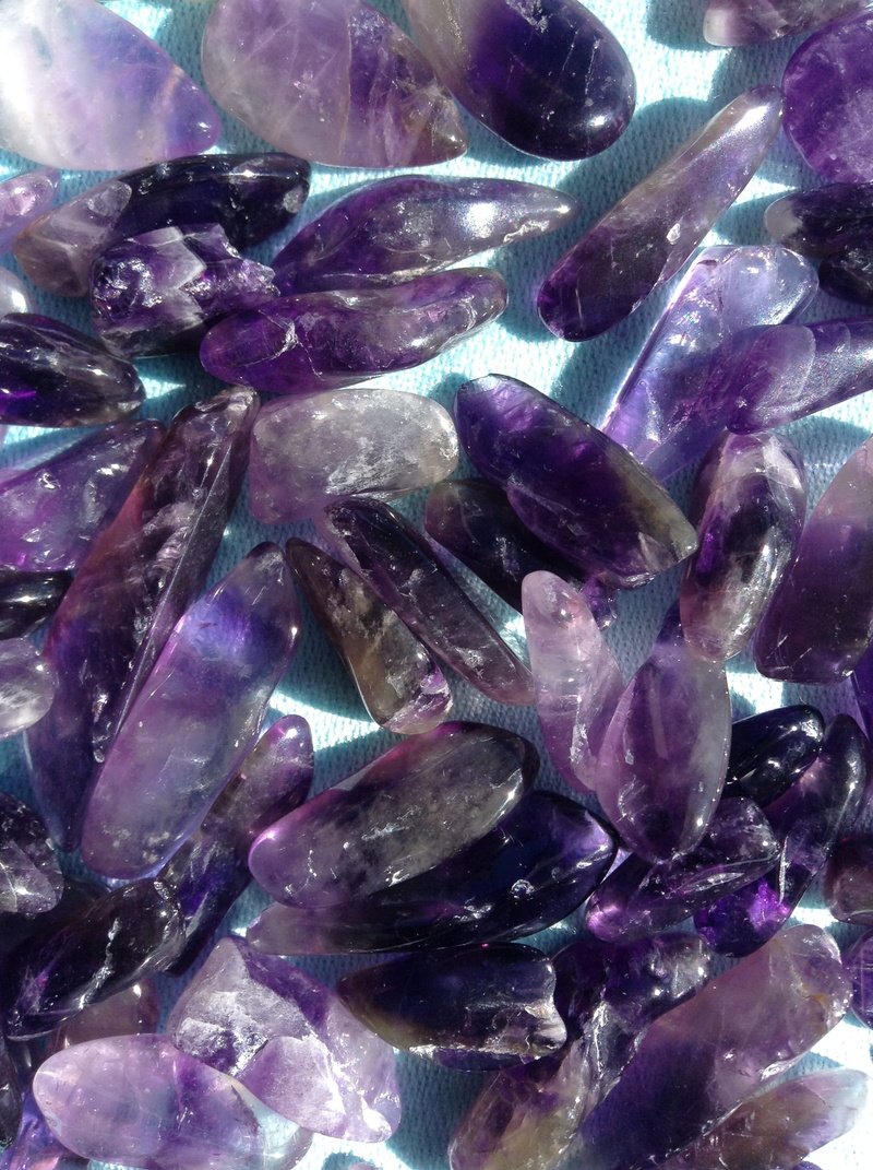 textured, geological, jewelry, expense, natural gemstone, gemstone, solid, 2K, gem, shiny, backgrounds, crystal, pattern, pink color, no people, indoors