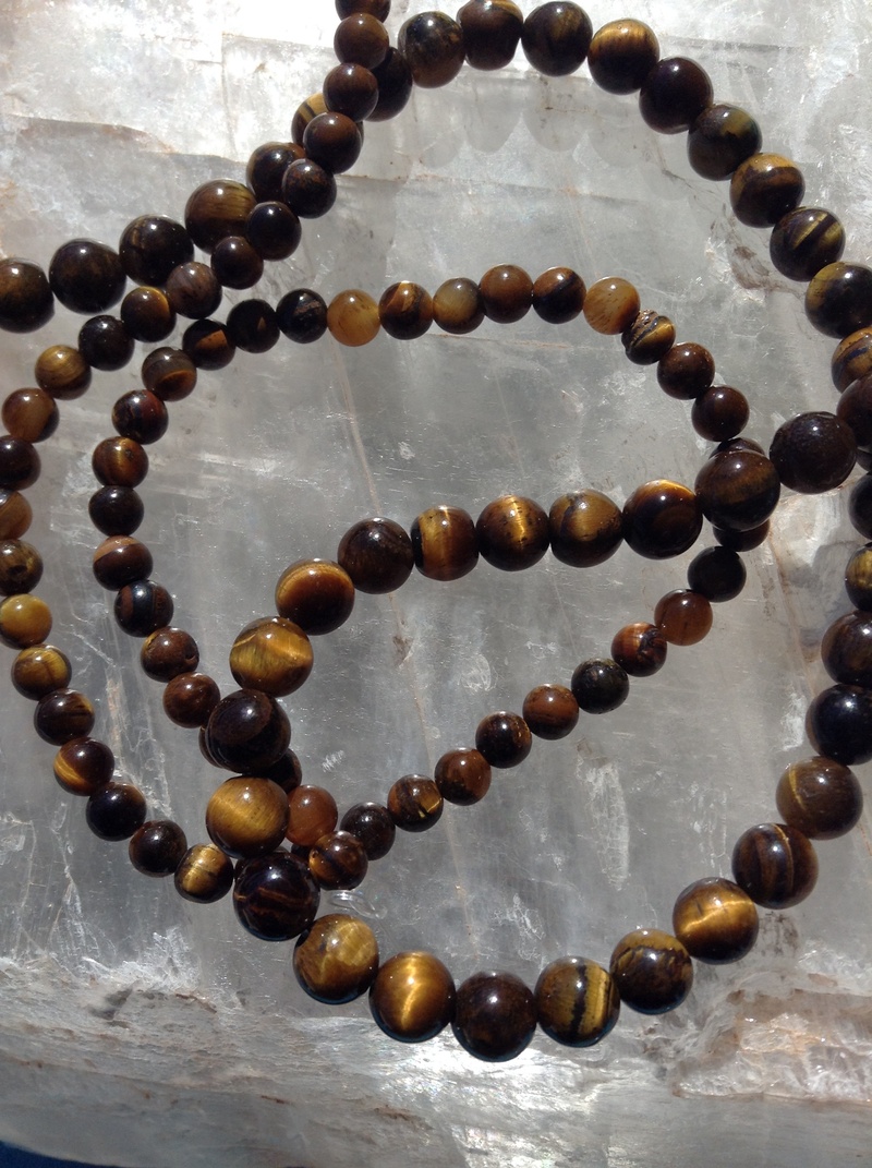 semiprecious, stones, art and craft, tigers eye beads, high angle view, food and drink, focus on foreground, food, gemstone, arrangement, semi-precious