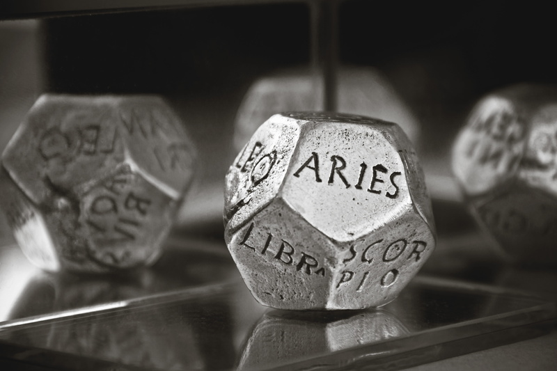constellation, communication, no people, close-up, metal, astronomy, art and craft, scale, stones, silver, wood - material, text, table, dice, number, western script