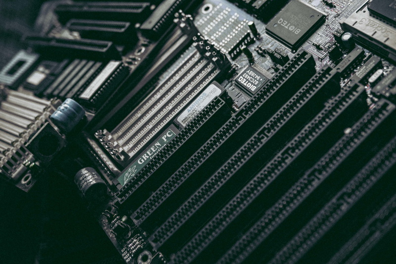 connection, slot, internet, electronics, circuit board, no people, black color, global communications, backgrounds, motherboard, indoors, close-up, gray