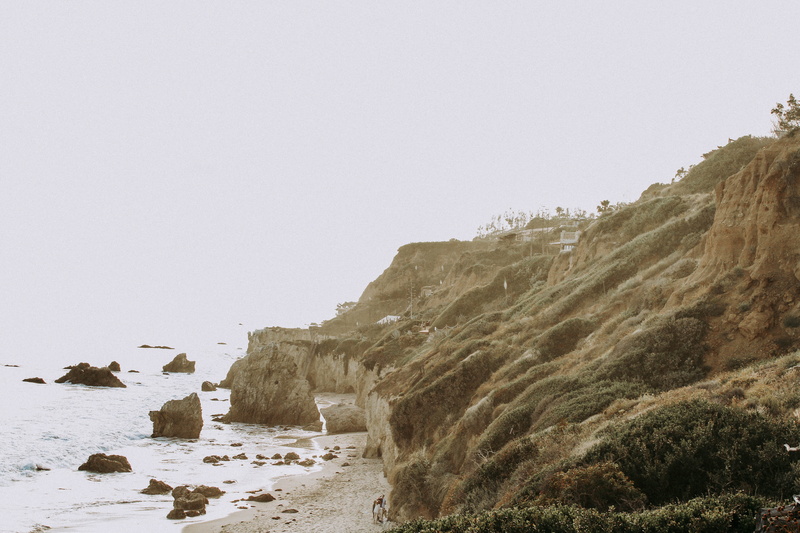 outdoors, beauty in nature, cliff, malibu, clear sky, united states, rock - object, day, eroded, tranquility, solid, rocky coastline, copy space, scenics - nature