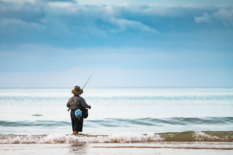 blue, catching, fisherman, activity, ocean, cloud - sky, standing, seashore, female, wave, silhouette, future, self-depended, person, horizon over water