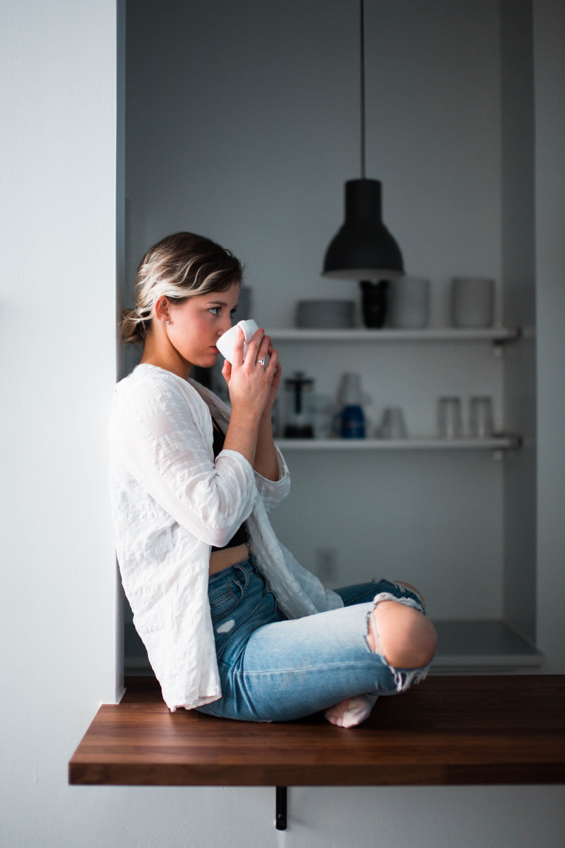holding, casual clothing, hairstyle, one person, contemplation, three quarter length, adult, white, sitting, cup, window, 5K, relaxation, day, platform