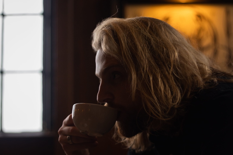 drink, photography, food and drink, man, holding, contemplation, hot drink, hairstyle, drinking, profile view, cup, sipping, headshot, side view, selective