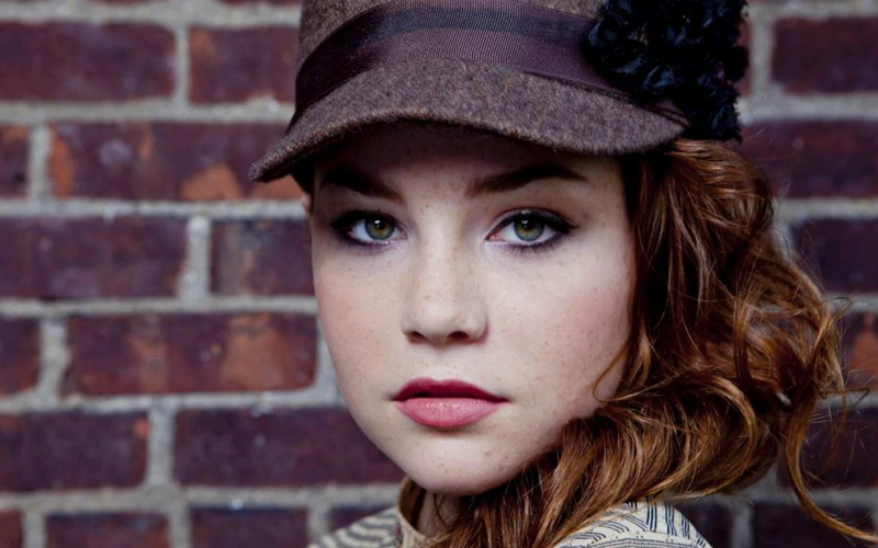 city, young adult, body part, social issues, redhead, headshot, women, adult, hairstyle, depression - sadness, clothing, teenager, one person, brick wall