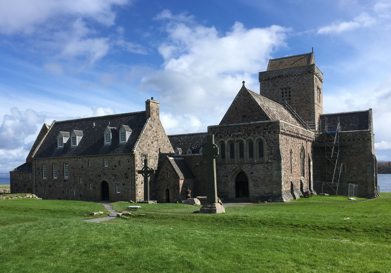 grass, religious buildings, abbey, land, outdoors, religion, green color, celtic christianity, place of worship, lawn, day, architecture, nature, building exterior