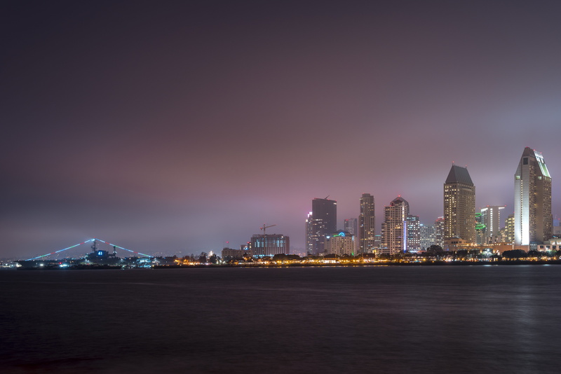 travel destinations, beach, centennial park, building exterior, city, night, city lights, skyscraper, sea, sky, outdoors, tall - high, cityscapes, fog