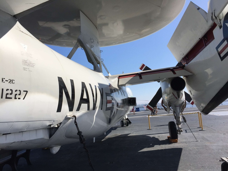 travel, people, black, airport, uss midway, navy plane, airplane, transportation, mode of transportation, propeller, cockpit, airport runway, occupation