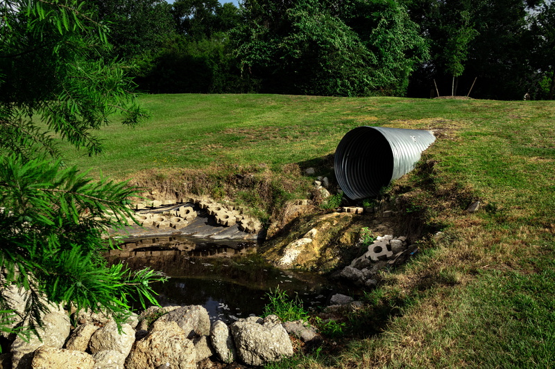 pollution, tranquility, no people, polluted, ecology, 5K, sewer, sewage pipe polluted water, tree, beauty in nature, nature, erosion, green color, environmental
