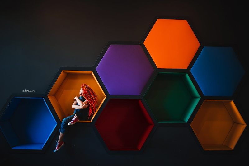 high angle view, young adult, adult, dreadlocks, studio shot, Converse, women, indoors, multi colored, dyed hair, relaxation, hexagon, wireless technology
