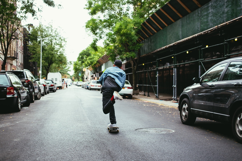 recreation, sewer manhole cover, fast, full length, jawdropping, style, jump, architecture, dynamic, 20-25 year old, casual clothing, day, trees, sneakers
