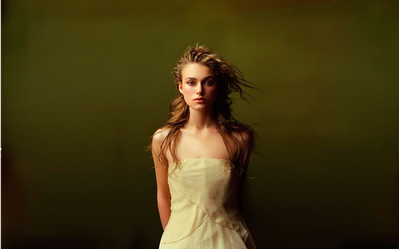 dress, hairstyle, black background, indoors, young adult, adult, contemplation, teenager, waist up, long hair, standing, 2K, Keira Knightley, fashion