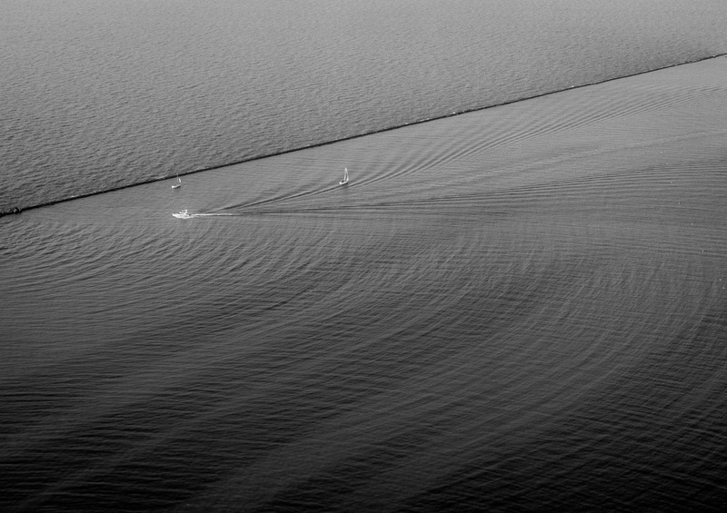 beauty in nature, waterfront, monochrome, sea, ps, beach, landscape, no people, tranquil scene, boat, nature, idyllic, day, sony, console, black, water