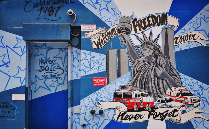 urban, street, tag, outdoors, blue, symbol, text, wall, male likeness, creativity, painted, city, 2K, building exterior, white, nyc, built structure, cityscape