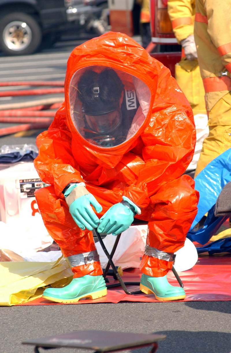 hazmat, gas, orange color, wheel, training, protective, working, suit, real people, chemical, hazardous, wear, mask, workwear, safety, responsibility, mode of transportation