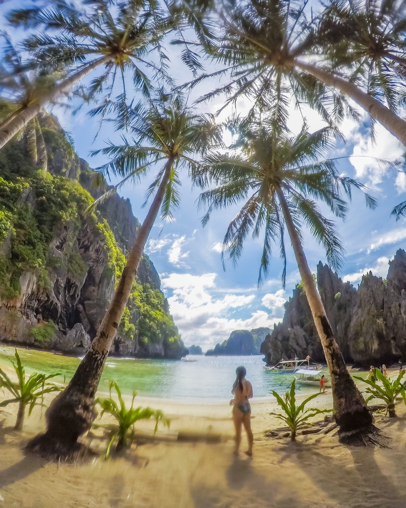 outdoors, trip, lifestyles, beauty in nature, palawan, el nido, palm tree, nature, palawan, sea, beach, vacations, one person, 2K, tranquil scene, mountain