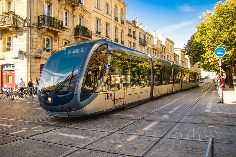 train - vehicle, cable car, city street, rail transportation, public transportation, architecture, daytime, tram, subway train, railroad car, transportation
