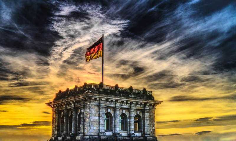 no people, light, dramatic, facade, german flag, built structure, the past, evening, architecture, storm, building exterior, orange color, cloud - sky