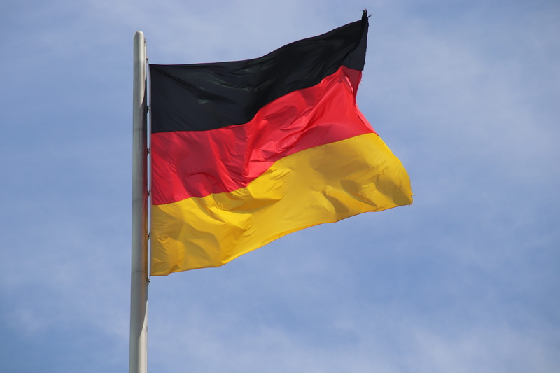 patriotism, nature, black, national icon, land, sky, world champion, low angle view, flag, national flag, cloud - sky, world championship, german flag