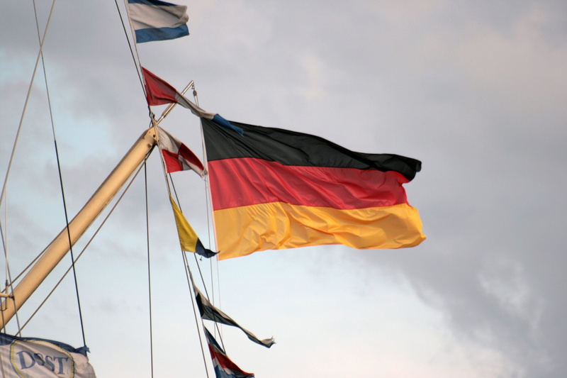 environment, independence, no people, sailboat, waving, low angle view, cloud - sky, textile, patriotism, gloomy sky, national icon, day, flag, motion
