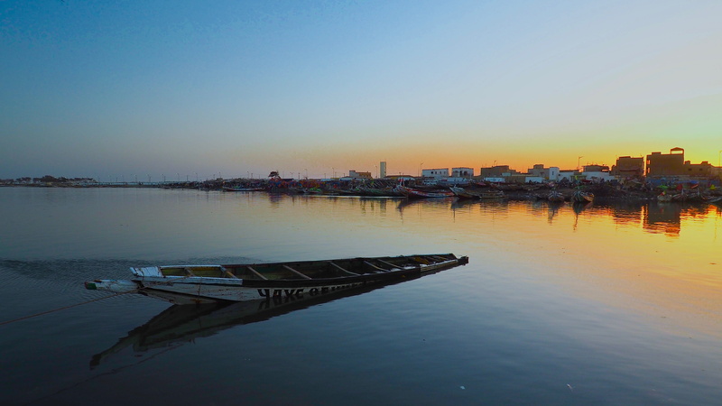 transportation, rowboat, building exterior, sunset, senegal, no people, africa, built structure, copy space, clear sky, sky, senegal river, canoe, outdoors