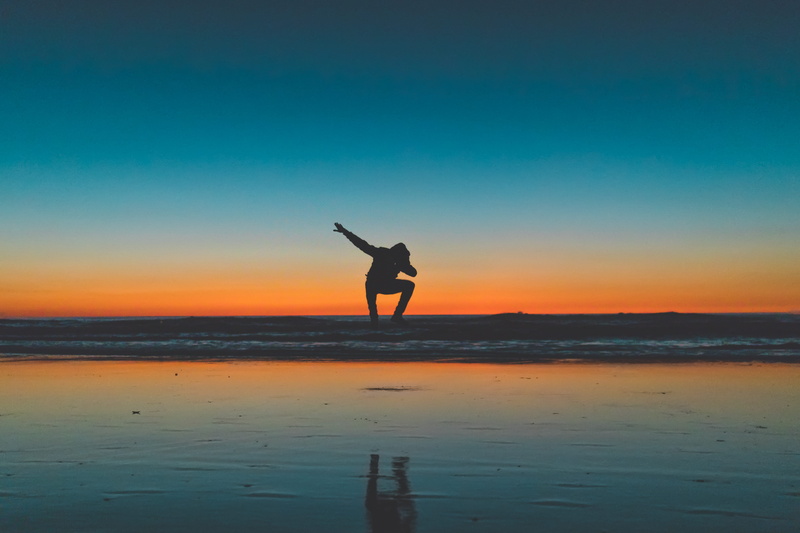 beach sunset, dab, ocean, colors, having fun, sunset, sky, silhouette, water, horizon, ocean beach, real people, leisure activity, beauty in nature, arms raised